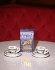 Due tazzine da caffè e latta di caffè Gambrinus 250gr