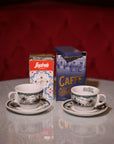 Due tazze da cappuccino e latta di caffè Gambrinus 250gr